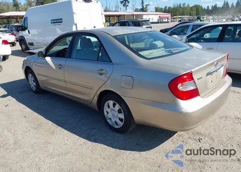 2002 Toyota Camry Le z USA, uszkodzony, nr VIN 4T1BE32K82U534669